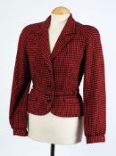 A Jaeger red and black dog tooth waist coat (size 8) together with seven various other waist coats