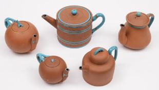 Five various Watcombe (Torquay) pottery teapots: after early English or Yixing prototypes,