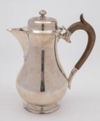 A George V silver hot water jug, maker Edward Barnard and Sons Ltd, London, 1920:, initialled,