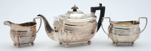 A George V silver three-piece tea service, maker Charles Stuart Harris, London,