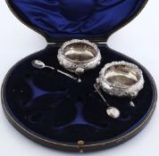 A pair of plated circular salts: with gadrooned border, raised on three swept feet, 6.5cm.