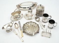 A quantity of ep items: including sugar castor,  flatware, tobacco jar, basket, toast rack etc.