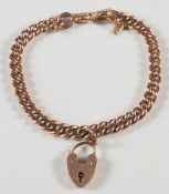 A 9ct gold curb-link bracelet: with padlock clasp and safety chain,