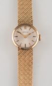 A lady's 9ct gold 'Garrard' wristwatch:,