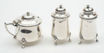 An Edward VII silver three piece condiment set, makers mark worn, Chester 1906, 6.15ozs:.