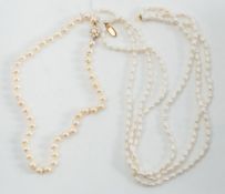 A cultured pearl single string necklace with 9ct gold floral clasp,