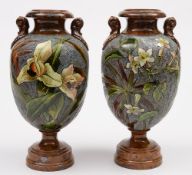 A pair of Watcombe (Torquay) pottery pedestal vases: of oviform with anthemion handles and flaring