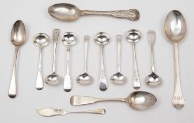 A collection of assorted silver mustard spoons, various makers and dates: a silver butter knife,