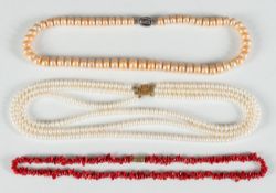 Three necklaces to include a freshwater cultured pearl single string necklace,