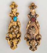 A pair of gold, seed pearl and gem set earrings of open scroll-work design,