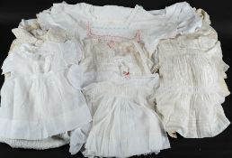A collection of camisole's, vests, undergarments, child's pinafores,