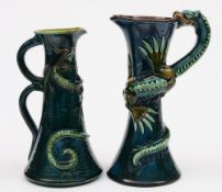Two Longpark (Torquay) pottery 'dragon' ewers:one of waisted form with pinched rim,