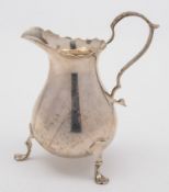 An Edward VII silver cream jug, maker Hamilton & Inches, Edinburgh,1905 :, of baluster form,