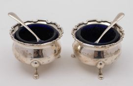 A pair of George V silver salts, maker Mappin and Webb, Birmingham, 1911:, of circular outline,