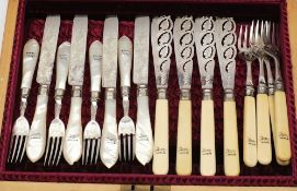 Four Birmingham silver fruit knives and forks with mother of pearl handles: and four Birmingham