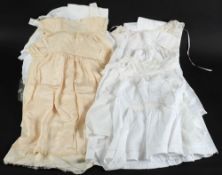 A collection of children's gowns,