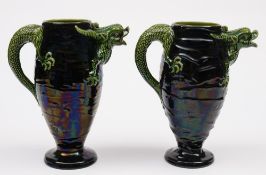 A pair of Aller Vale (Torquay) grotesque dragon ewers: each of oviform,