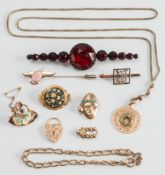 Three costume brooches/pins, three gold brooches, a gold curb-link bracelet, a gold fitting,