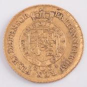 A George III half-guinea 1804, better than fine condition:.