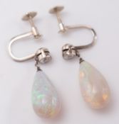 A pair of opal and diamond drop earrings:,