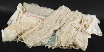 A Brussels applique lace stole, assorted lace and machine lace applied panels and edgings:.