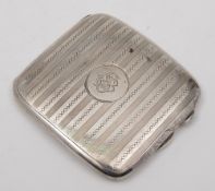 A George V silver cigarette case, maker C.