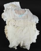 A collection of lady's undergarments, gowns, vests and petticoats,