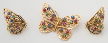 An 18ct gold, multi-gem set 'butterfly' brooch with matching 18ct gold 'butterfly' earrings:.