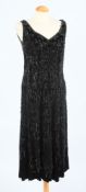 A black velvet and beaded evening dress and a turquoise beaded evening dress: (2)