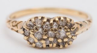 A gold and diamond mounted double cluster ring:.