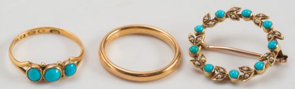 A 22ct gold and turquoise three-stone ring,
