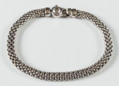 An 18ct yellow gold, mesh-link bracelet:, approximately 17gms gross weight.