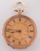 A lady's gold open face, key wound pocket watch:, the dial with Roman numerals and foliate design,