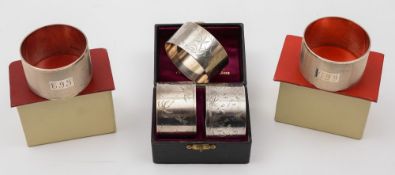 A pair of Elizabeth II silver napkin rings, maker T&S, Birmingham, 1962: initialled,