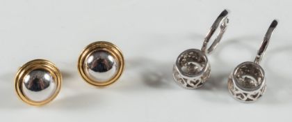 A pair of white gold and diamond circular earrings and a pair of two colour gold circular ear