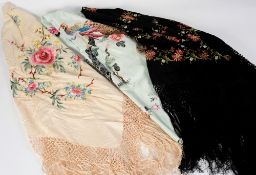 A Chinese pale blue silk shawl with embroidered floral decoration and fringe border,