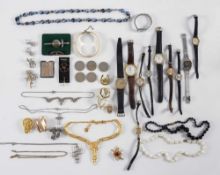 A lady's 9ct gold cased wristwatch, a lady's 'Omega' wristwatch,