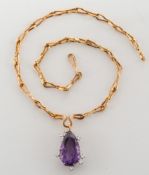 An amethyst and diamond pendant on chain: with tear-drop amethyst approximately 23mm long x 13mm