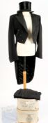 A Hector Powe morning suit, a Christys silk top hat, a Dunn & Co top hat, and two cotton shirts:.