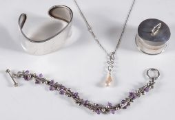 A Mexican open bangle stamped '925', an amethyst bead mounted bracelet,