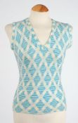 Two cashmere tank tops, a pullover,
