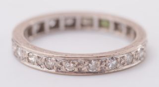 A diamond eternity ring:, pave-set with single-cut diamonds, ring size M.