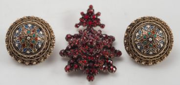 A Bohemian garnet pendant and a pair of enamelled circular ear-clips:.