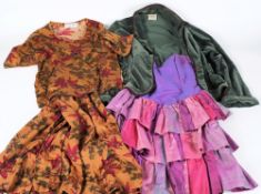 A Jaeger floral printed cotton two piece skirt and blouse, a Coral Reef green velvet jacket:,
