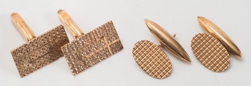 A pair of 9ct gold rectangular panel cuff-links and a pair of oval panel cuff-links:.