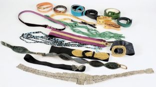 A pierced metal nurses belt, together with a collection of various belts, accessories:, etc.