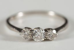 A graduated diamond, three stone ring: with circular,