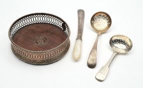 A George III silver wine coaster, two silver sugar sifters and a butter knife:.