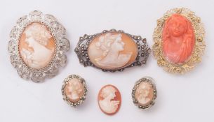 A coral cameo mounted brooch, five cameo jewellery items and one loose cameo:.