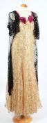 A Victorian dark red silk bodice together with a black sequin throw, a sequin dress,